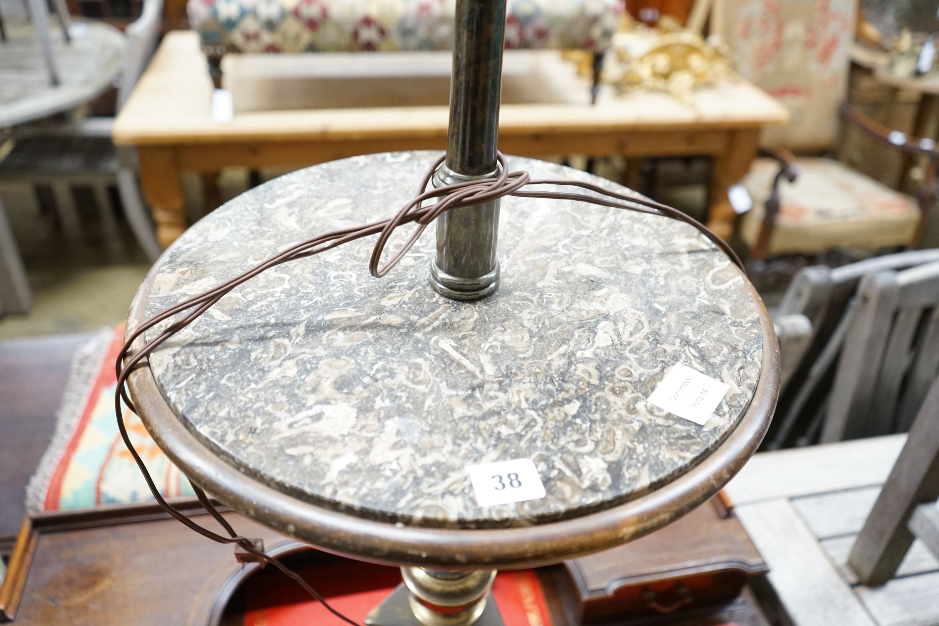 A polished gilt metal and marble tripod floor lamp, height 110cm